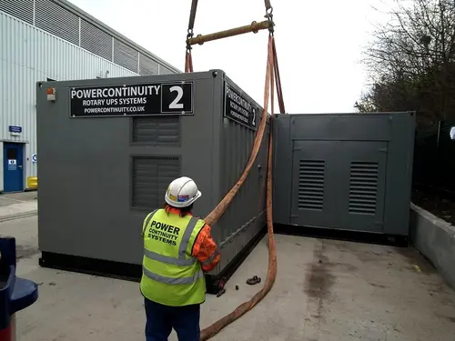 Power continuity engineer delivering rotary flywheel ups