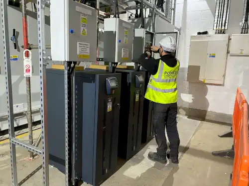 Power continuity engineer servicing a ups