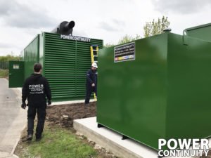 Power continuity engineers and diesel generator in green container