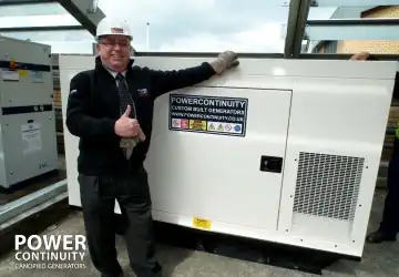 Power continuity installed generator with smiling engineer